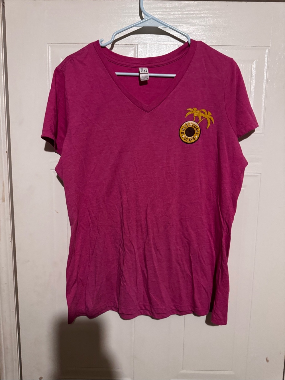 District Women's Magenta V-Neck Tee with Yellow Palm Emblem